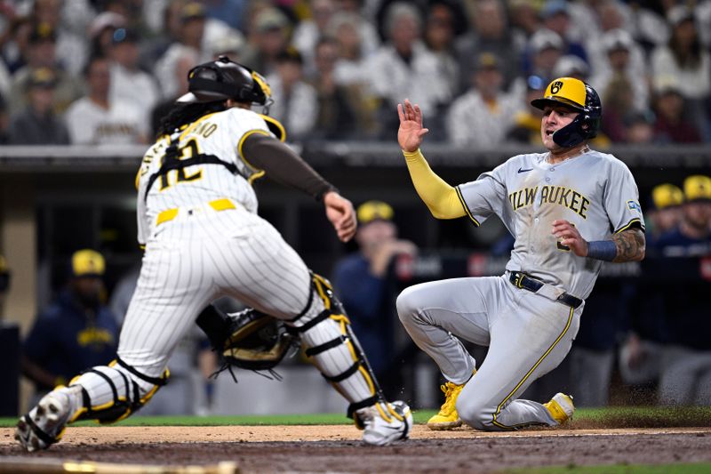 Jun 20, 2024; San Diego, California, USA; Milwaukee Brewers third baseman Joey Ortiz (3) scores a run ahead of the throw to San Diego Padres catcher Luis Campusano (12) during the eighth inning at Petco Park. Mandatory Credit: Orlando Ramirez-USA TODAY Sports