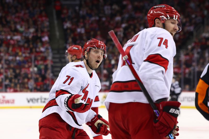 Mar 9, 2024; Newark, New Jersey, USA; Carolina Hurricanes right wing Jesper Fast (71) reacts to a penalty call against the New Jersey Devils during the second period at Prudential Center. Mandatory Credit: Ed Mulholland-USA TODAY Sports