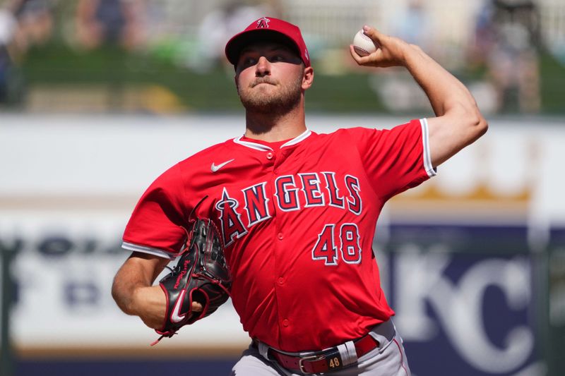 Mar 13, 2024; Surprise, Arizona, USA; Los Angeles Angels starting pitcher Reid Detmers (48) pitches against the Kansas City Royals during the first inning at Surprise Stadium. Mandatory Credit: Joe Camporeale-USA TODAY Sports