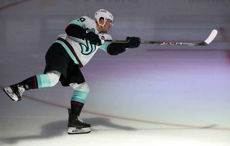 Jan 14, 2025; Pittsburgh, Pennsylvania, USA;  Seattle Kraken defenseman Vince Dunn (29) warms up before a game against the Pittsburgh Penguins at PPG Paints Arena. Mandatory Credit: Charles LeClaire-Imagn Images