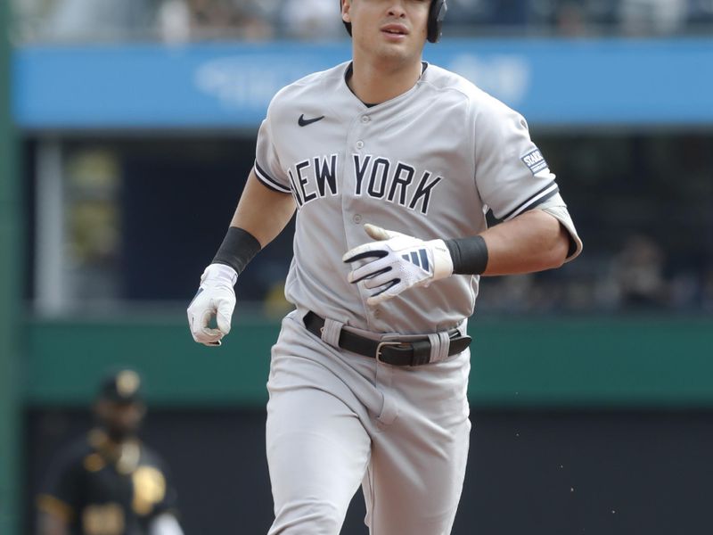 Sep 17, 2023; Pittsburgh, Pennsylvania, USA;  New York Yankees shortstop Anthony Volpe (11) circles the bases on a solo home run against the Pittsburgh Pirates during the seventh inning at PNC Park. Pittsburgh won 3-2. Mandatory Credit: Charles LeClaire-USA TODAY Sports