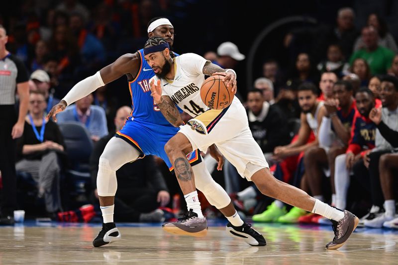 OKLAHOMA CITY, OKLAHOMA - NOVEMBER 13: Brandon Ingram #14 of the New Orleans Pelicans attempts to drive past Luguentz Dort #5 of the Oklahoma City Thunder during the second half at Paycom Center on November 13, 2024 in Oklahoma City, Oklahoma. NOTE TO USER: User expressly acknowledges and agrees that, by downloading and or using this photograph, User is consenting to the terms and conditions of the Getty Images License Agreement. (Photo by Joshua Gateley/Getty Images)