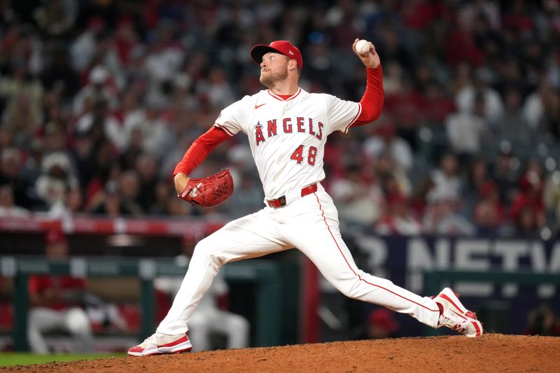 May 28, 2025; Anaheim, California, USA; Los Angeles Angels relief pitcher Reid Detmers (48) throws in the eighth inning against the New York Yankees at Angel Stadium. Mandatory Credit: Kirby Lee-Imagn Images