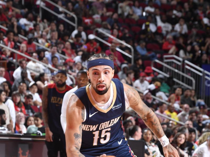 HOUSTON, TX - OCTOBER 15: Jose Alvarado #15 of the New Orleans Pelicans drives to the basket during the game against the Houston Rockets during a NBA preseason game on October 15, 2024 at the Toyota Center in Houston, Texas. NOTE TO USER: User expressly acknowledges and agrees that, by downloading and or using this photograph, User is consenting to the terms and conditions of the Getty Images License Agreement. Mandatory Copyright Notice: Copyright 2024 NBAE (Photo by Logan Riely/NBAE via Getty Images)