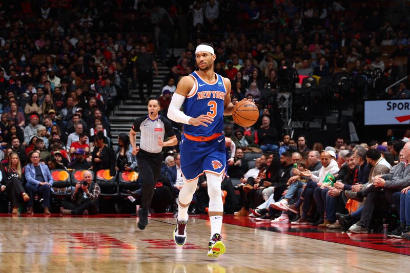 TORONTO, CANADA - MARCH 27: Josh Hart #3 of the New York Knicks dribbles the ball during the game against the Toronto Raptors on March 27, 2024 at the Scotiabank Arena in Toronto, Ontario, Canada.  NOTE TO USER: User expressly acknowledges and agrees that, by downloading and or using this Photograph, user is consenting to the terms and conditions of the Getty Images License Agreement.  Mandatory Copyright Notice: Copyright 2024 NBAE (Photo by Vaughn Ridley/NBAE via Getty Images)