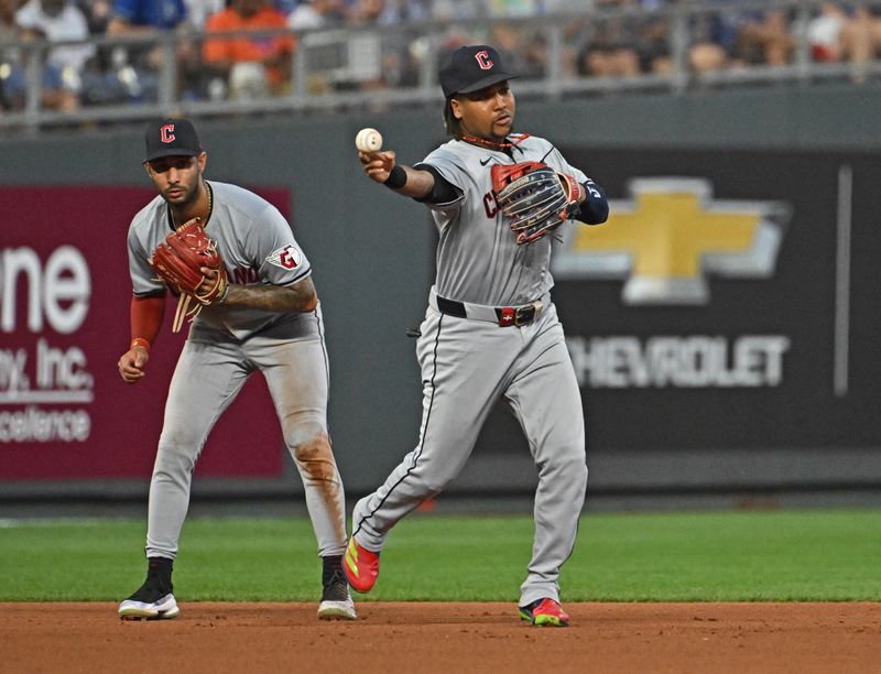 Jun 28, 2024; Kansas City, Missouri, USA;  Cleveland Guardians third baseman Jose Ramirez (11) throws to second base for an out in the fourth inning against the Kansas City Royals at Kauffman Stadium. Mandatory Credit: Peter Aiken-USA TODAY Sports