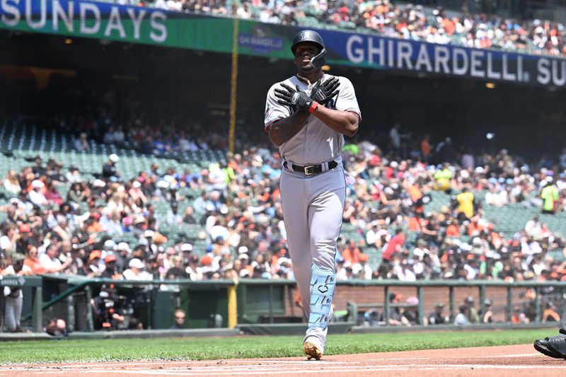 May 21, 2023; San Francisco, California, USA; Miami Marlins designated hitter Jorge Soler (12) reacts after hitting a one run home run against the San Francisco Giants during the first inning at Oracle Park. Mandatory Credit: Robert Edwards-USA TODAY Sports