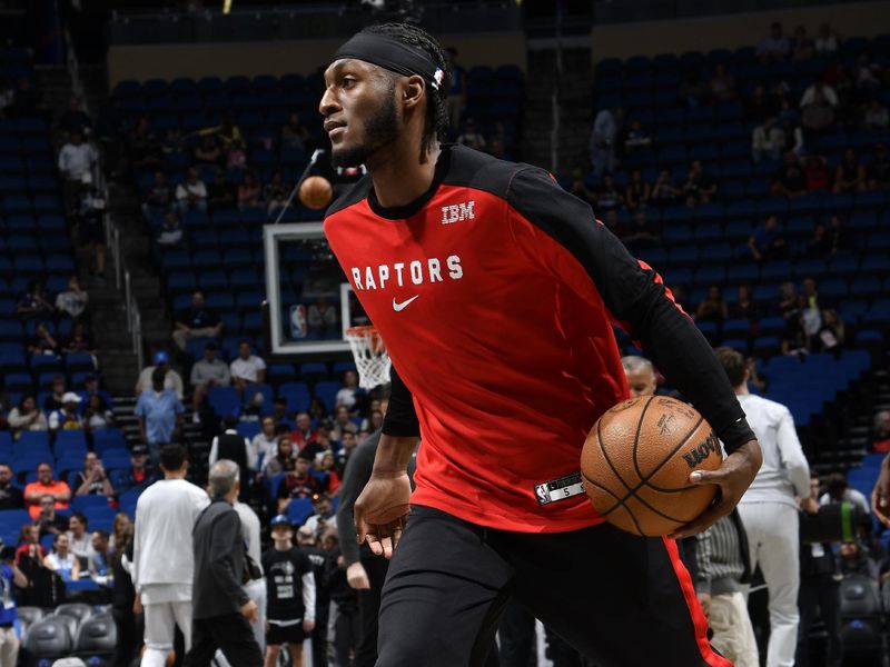 ORLANDO, FL - MARCH 4:  Immanuel Quickley #5 of the Toronto Raptors warms up before the game on March 4, 2025 at Kia Center in Orlando, Florida. NOTE TO USER: User expressly acknowledges and agrees that, by downloading and or using this photograph, User is consenting to the terms and conditions of the Getty Images License Agreement. Mandatory Copyright Notice: Copyright 2025 NBAE (Photo by Fernando Medina/NBAE via Getty Images)