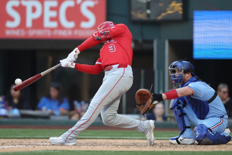 Sep 8, 2024; Arlington, Texas, USA; Los Angeles Angels left fielder Taylor Ward (3) hits a double against the Texas Rangers in the eighth inning  at Globe Life Field. Mandatory Credit: Tim Heitman-Imagn Images