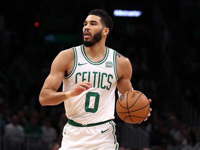 BOSTON, MASSACHUSETTS - JANUARY 05: Jayson Tatum #0 of the Boston Celtics dribbles downcourt against the Utah Jazz during the first quarter at TD Garden on January 05, 2024 in Boston, Massachusetts. NOTE TO USER: User expressly acknowledges and agrees that, by downloading and or using this photograph, user is consenting to the terms and conditions of the Getty Images License Agreement.  (Photo by Maddie Meyer/Getty Images)