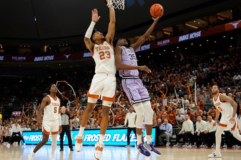 Jan 3, 2023; Austin, Texas, USA; Kansas State Wildcats forward Nae'Qwan Tomlin (35) shoots over Texas Longhorns forward Dillon Mitchell (23) during the second half at Moody Center. Mandatory Credit: Scott Wachter-USA TODAY Sports