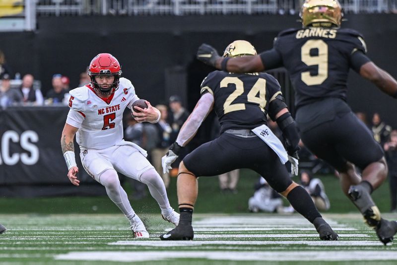 Nov 11, 2023; Winston-Salem, North Carolina, USA; North Carolina State Wolfpack quarterback Brennan Armstrong (5) runs the ball against Wake Forest Demon Deacons linebacker Dylan Hazen (24) during the second half at Allegacy Federal Credit Union Stadium. Mandatory Credit: William Howard-USA TODAY Sports