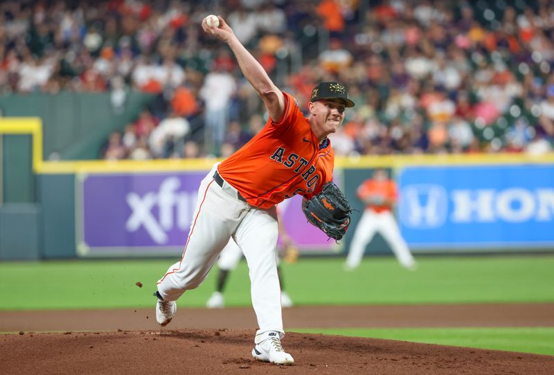 May 17, 2024; Houston, Texas, USA;  Houston Astros starting pitcher Hunter Brown (58) pitches against the Milwaukee Brewers in the first inning at Minute Maid Park. Mandatory Credit: Thomas Shea-USA TODAY Sports