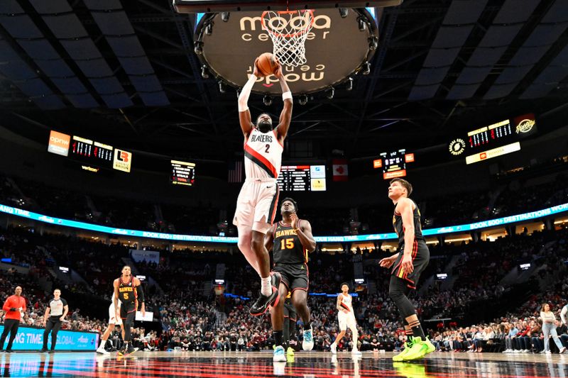 PORTLAND, OREGON - MARCH 13: Deandre Ayton #2 of the Portland Trail Blazers dunks the ball during the first quarter of the game against the Atlanta Hawks at the Moda Center on March 13, 2024 in Portland, Oregon. The Portland Trail Blazers won 106-102. NOTE TO USER: User expressly acknowledges and agrees that, by downloading and or using this photograph, User is consenting to the terms and conditions of the Getty Images License Agreement. (Photo by Alika Jenner/Getty Images)