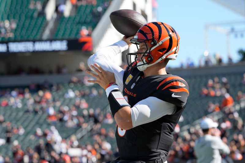 Cincinnati Bengals quarterback Joe Burrow warms up before an NFL football game against the Las Vegas Raiders in Cincinnati, Sunday, Nov. 3, 2024. (AP Photo/Jeff Dean)