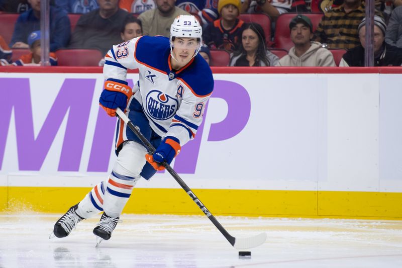 Nov 19, 2024; Ottawa, Ontario, CAN; Edmonton Oilers center Ryan Nugent-Hopkins (93) skates with the puck in the second period against the Ottawa Senators at the Canadian Tire Centre. Mandatory Credit: Marc DesRosiers-Imagn Images