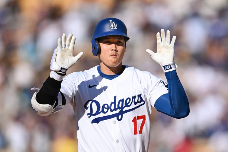 Jul 21, 2024; Los Angeles, California, USA; Los Angeles Dodgers designated hitter Shohei Ohtani (17) celebrates after hitting a solo home run against the Boston Red Sox during the fifth inning at Dodger Stadium. Mandatory Credit: Jonathan Hui-USA TODAY Sports