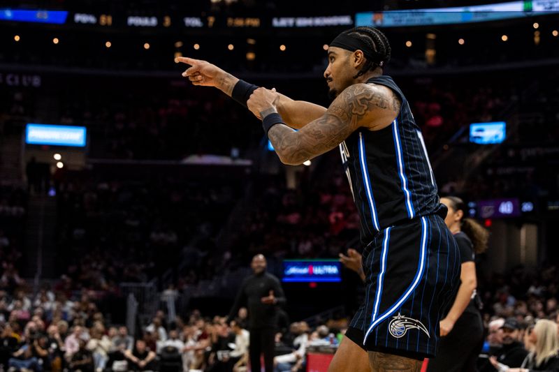 CLEVELAND, OHIO - FEBRUARY 22: Gary Harris #14 of the Orlando Magic celebrates after a basket during the second quarter of the game against the Cleveland Cavaliers at Rocket Mortgage Fieldhouse on February 22, 2024 in Cleveland, Ohio. NOTE TO USER: User expressly acknowledges and agrees that, by downloading and or using this photograph, User is consenting to the terms and conditions of the Getty Images License Agreement. (Photo by Lauren Leigh Bacho/Getty Images)