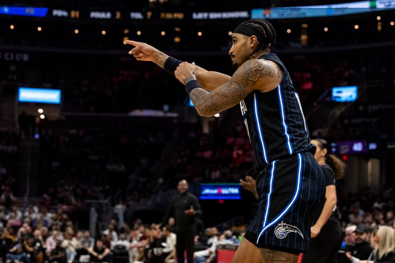 CLEVELAND, OHIO - FEBRUARY 22: Gary Harris #14 of the Orlando Magic celebrates after a basket during the second quarter of the game against the Cleveland Cavaliers at Rocket Mortgage Fieldhouse on February 22, 2024 in Cleveland, Ohio. NOTE TO USER: User expressly acknowledges and agrees that, by downloading and or using this photograph, User is consenting to the terms and conditions of the Getty Images License Agreement. (Photo by Lauren Leigh Bacho/Getty Images)