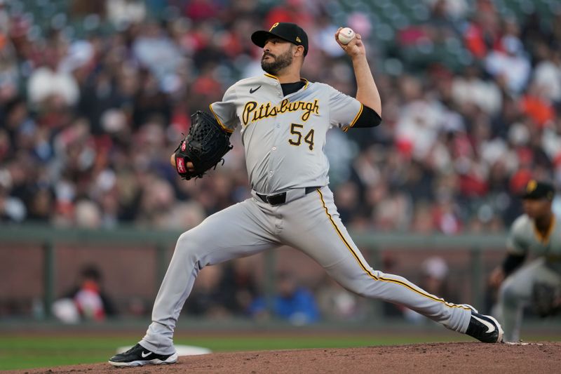 Apr 27, 2024; San Francisco, California, USA; Pittsburgh Pirates pitcher Martin Perez (54) throws a pitch against the San Francisco Giants during the first inning at Oracle Park. Mandatory Credit: Darren Yamashita-USA TODAY Sports