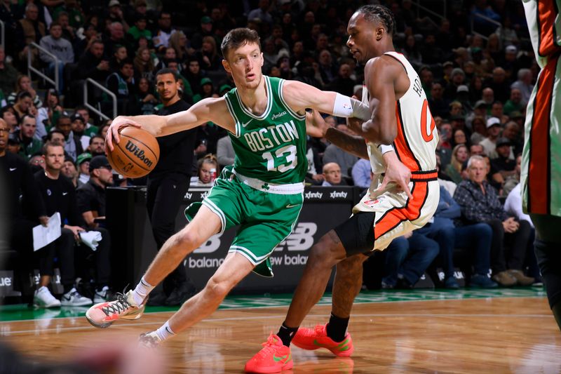 BOSTON, MA - DECEMBER 4: Drew Peterson #13 of the Boston Celtics drives to the basket during the game against the Detroit Pistons on December 4, 2024 at TD Garden in Boston, Massachusetts. NOTE TO USER: User expressly acknowledges and agrees that, by downloading and/or using this Photograph, user is consenting to the terms and conditions of the Getty Images License Agreement. Mandatory Copyright Notice: Copyright 2024 NBAE (Photo by Brian Babineau/NBAE via Getty Images)