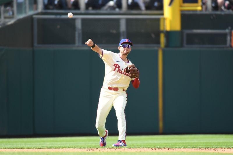 Sep 15, 2024; Philadelphia, Pennsylvania, USA;Philadelphia Phillies shortstop Trea Turner (7) throws to first base during the sixth inning against the New York Mets at Citizens Bank Park. Mandatory Credit: Eric Hartline-Imagn Images