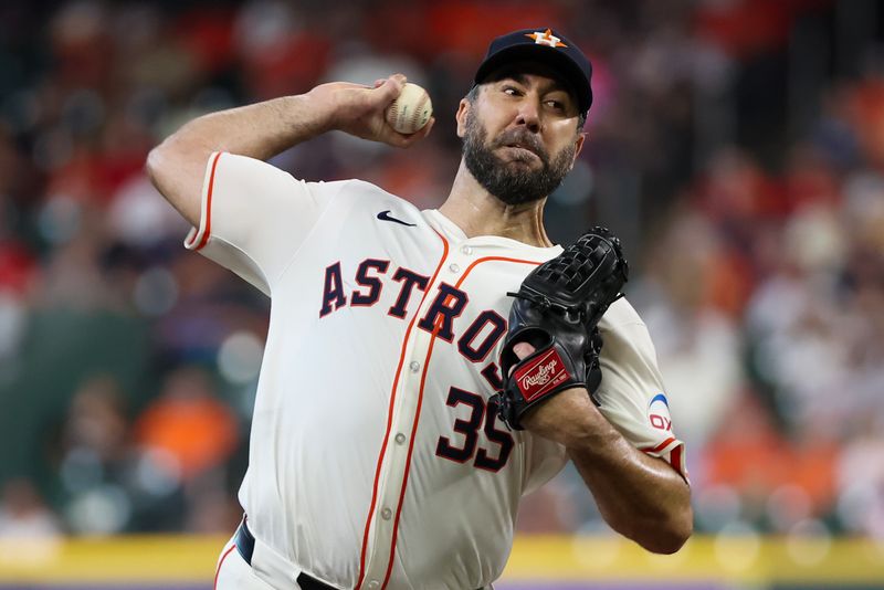 Aug 21, 2024; Houston, Texas, USA;  Houston Astros starting pitcher Justin Verlander (35) pitches against the Boston Red Sox in there second inning at Minute Maid Park. Mandatory Credit: Thomas Shea-USA TODAY Sports