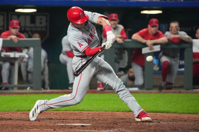 Aug 19, 2024; Kansas City, Missouri, USA; Los Angeles Angels catcher Logan O'Hoppe (14) hits a single against the Kansas City Royals at Kauffman Stadium. Mandatory Credit: Denny Medley-USA TODAY Sports