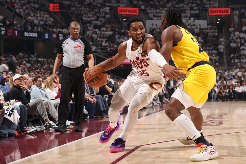 CLEVELAND, OH - MAY 6:  Donovan Mitchell #45 of the Cleveland Cavaliers drives to the basket during the game against the Indiana Pacers during Round 2 Game 2 of the 2025 NBA Playoffs on May 6, 2025 at Rocket Arena in Cleveland, Ohio. NOTE TO USER: User expressly acknowledges and agrees that, by downloading and/or using this Photograph, user is consenting to the terms and conditions of the Getty Images License Agreement. Mandatory Copyright Notice: Copyright 2025 NBAE (Photo by Joe Murphy/NBAE via Getty Images)