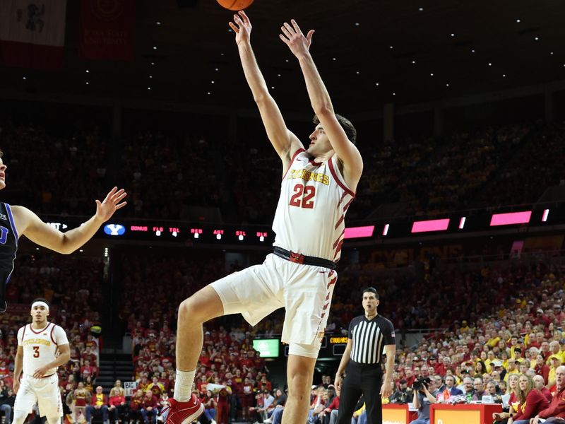 Mar 6, 2024; Ames, Iowa, USA;Iowa State Cyclones forward Milan Momcilovic (22) shoots against the Brigham Young Cougars  at James H. Hilton Coliseum. Mandatory Credit: Reese Strickland-USA TODAY Sports

