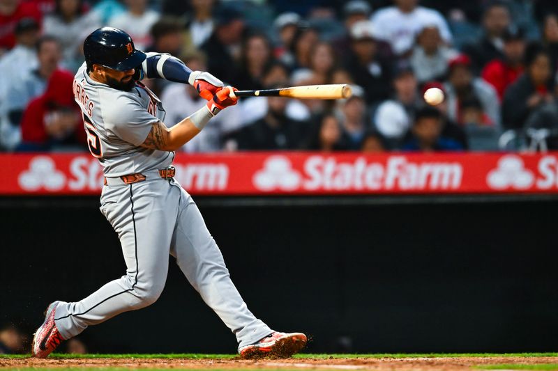 May 3, 2025; Anaheim, California, USA; 
Detroit Tigers second baseman Gleyber Torres (25) forced out at first base against the Los Angeles Angels during the fourth inning at Angel Stadium. Mandatory Credit: Jonathan Hui-Imagn Images
