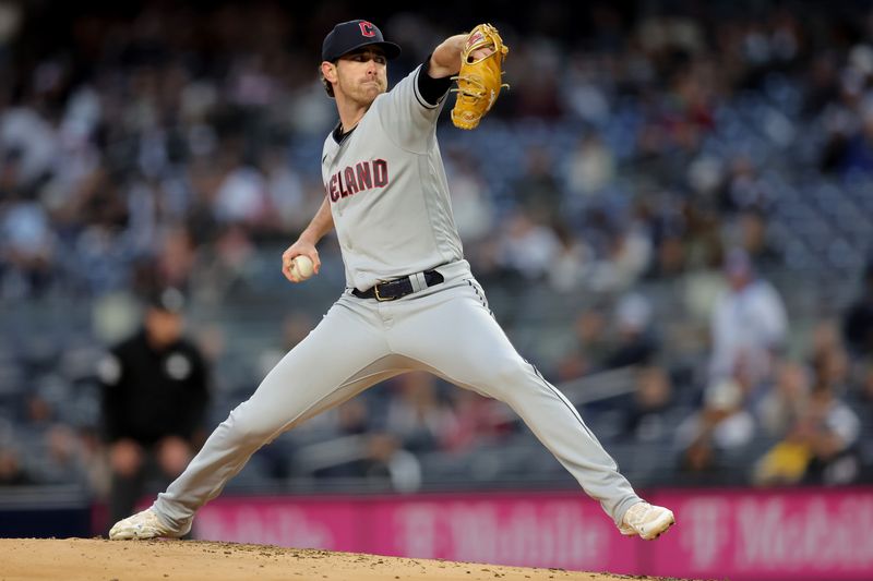 May 3, 2023; Bronx, New York, USA; Cleveland Guardians starting pitcher Shane Bieber (57) pitches against the New York Yankees during the first inning at Yankee Stadium. Mandatory Credit: Brad Penner-USA TODAY Sports