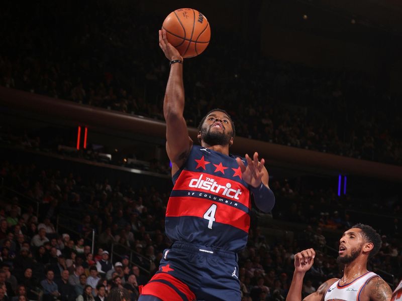 NEW YORK, NY - NOVEMBER 18: Jared Butler #4 of the Washington Wizards drives to the basket during the game against the New York Knicks on November 18, 2024 at Madison Square Garden in New York City, New York.  NOTE TO USER: User expressly acknowledges and agrees that, by downloading and or using this photograph, User is consenting to the terms and conditions of the Getty Images License Agreement. Mandatory Copyright Notice: Copyright 2024 NBAE  (Photo by Nathaniel S. Butler/NBAE via Getty Images)