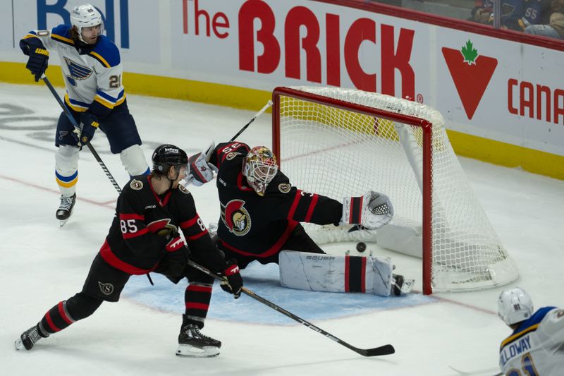 Oct 29, 2024; Ottawa, Ontario, CAN; St. Louis Blues center Dylan Holloway (81) scores on Ottawa Senators goalie Linus Ullmark (35) in the third period at the Canadian Tire Centre. Mandatory Credit: Marc DesRosiers-Imagn Images