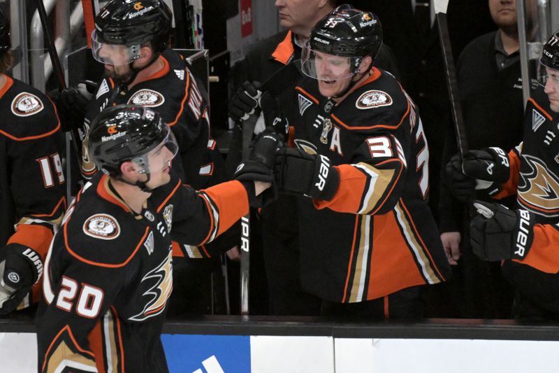 Mar 21, 2024; Anaheim, California, USA;  Anaheim Ducks right wing Brett Leason (20) is congratulated by right wing Jakob Silfverberg (33) after scoring a goal in the second period against the Chicago Blackhawks at Honda Center. Mandatory Credit: Jayne Kamin-Oncea-USA TODAY Sports