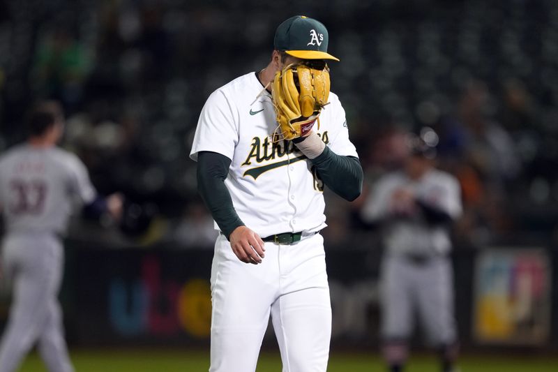 Sep 6, 2024; Oakland, California, USA; Oakland Athletics relief pitcher Mason Miller (19) reacts after the final out of the top of the tenth inning against the Detroit Tigers at Oakland-Alameda County Coliseum. Mandatory Credit: Darren Yamashita-Imagn Images