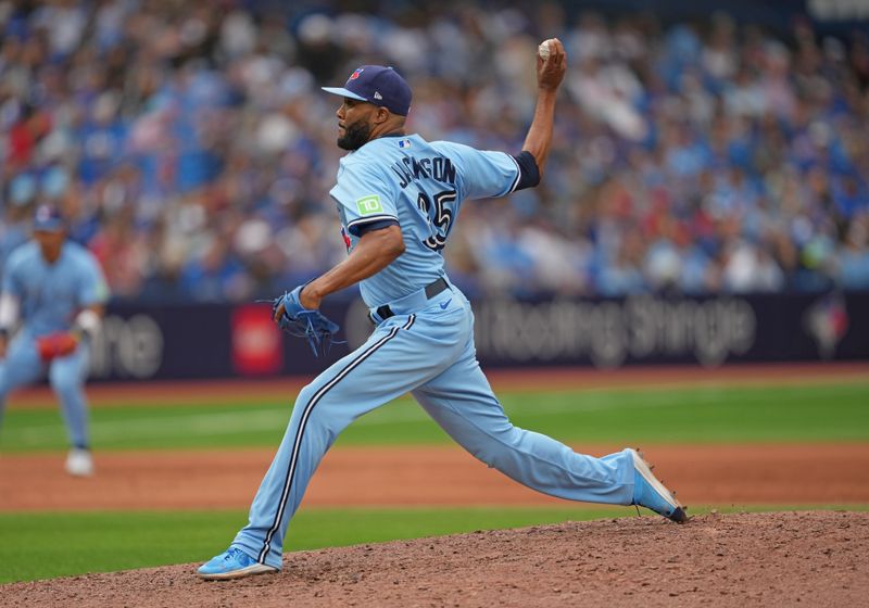 Aug 30, 2023; Toronto, Ontario, CAN; Toronto Blue Jays relief pitcher Jay Jackson (35) throws a pitch against the Washington Nationals during the ninth inning at Rogers Centre. Mandatory Credit: Nick Turchiaro-USA TODAY Sports