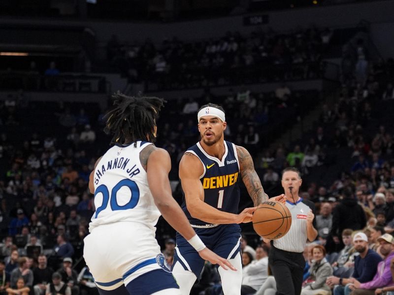 MINNEAPOLIS, MN - OCTOBER 17: Michael Porter Jr. #1 of the Denver Nuggets passes the ball during the game against the Minnesota Timberwolves during a NBA Preseason game on October 17, 2024 at Target Center in Minneapolis, Minnesota. NOTE TO USER: User expressly acknowledges and agrees that, by downloading and or using this Photograph, user is consenting to the terms and conditions of the Getty Images License Agreement. Mandatory Copyright Notice: Copyright 2024 NBAE (Photo by Jordan Johnson/NBAE via Getty Images)