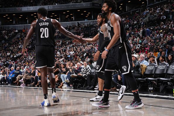 BROOKLYN, NY - NOVEMBER 26: Day'Ron Sharpe #20 high fives Trendon Watford #9 of the Brooklyn Nets during the game against the Chicago Bulls on November 26, 2023 at Barclays Center in Brooklyn, New York. NOTE TO USER: User expressly acknowledges and agrees that, by downloading and or using this Photograph, user is consenting to the terms and conditions of the Getty Images License Agreement. Mandatory Copyright Notice: Copyright 2023 NBAE (Photo by Jesse D. Garrabrant/NBAE via Getty Images)