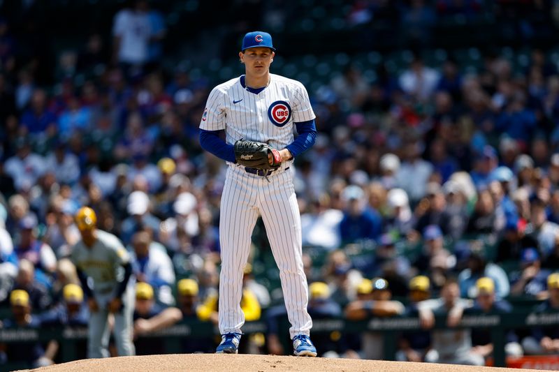 May 3, 2024; Chicago, Illinois, USA; Chicago Cubs starting pitcher Hayden Wesneski (19) delivers a pitch against the Milwaukee Brewers during the first inning at Wrigley Field. Mandatory Credit: Kamil Krzaczynski-USA TODAY Sports