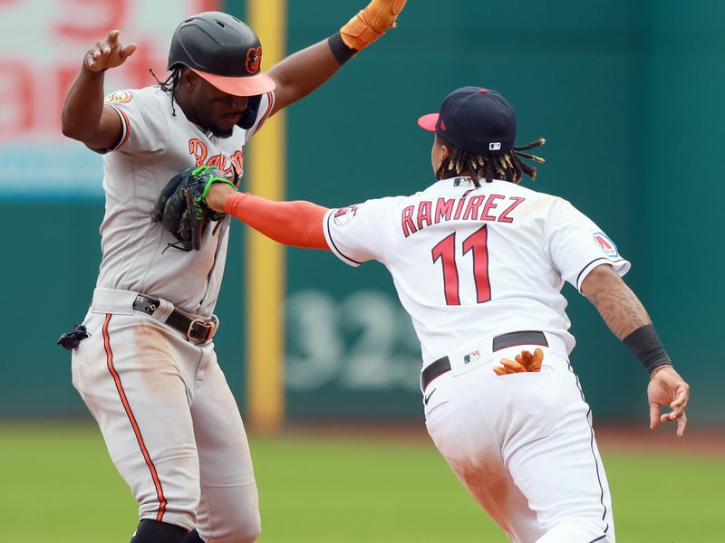 Sep 24, 2023; Cleveland, Ohio, USA; Cleveland Guardians third baseman Jose Ramirez (11) tags out Baltimore Orioles third baseman Jorge Mateo (3) in a run down during the eighth inning at Progressive Field. Mandatory Credit: Aaron Josefczyk-USA TODAY Sports