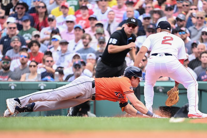 Aug 11, 2024; Boston, Massachusetts, USA; Houston Astros center fielder Jake Meyers (6) slides back to first base after hitting an RBI single during the fifth inning against the Boston Red Sox at Fenway Park. Mandatory Credit: Eric Canha-USA TODAY Sports