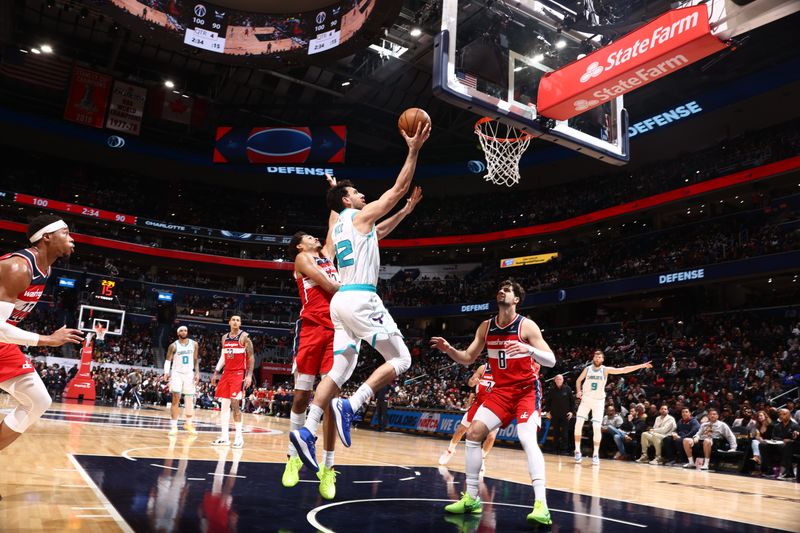 WASHINGTON, DC -? MARCH 8: Vasilije Micic #22 of the Charlotte Hornets shoots the ball during the game against the Washington Wizards on March 8, 2024 at Capital One Arena in Washington, DC. NOTE TO USER: User expressly acknowledges and agrees that, by downloading and or using this Photograph, user is consenting to the terms and conditions of the Getty Images License Agreement. Mandatory Copyright Notice: Copyright 2024 NBAE (Photo by Kenny Giarla/NBAE via Getty Images)