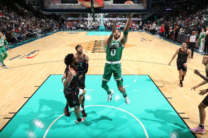 WASHINGTON, DC -? MARCH 17: Jayson Tatum #0 of the Boston Celtics drives to the basket during the game against the Washington Wizards on March 17, 2024 at Capital One Arena in Washington, DC. NOTE TO USER: User expressly acknowledges and agrees that, by downloading and or using this Photograph, user is consenting to the terms and conditions of the Getty Images License Agreement. Mandatory Copyright Notice: Copyright 2024 NBAE (Photo by Stephen Gosling/NBAE via Getty Images)