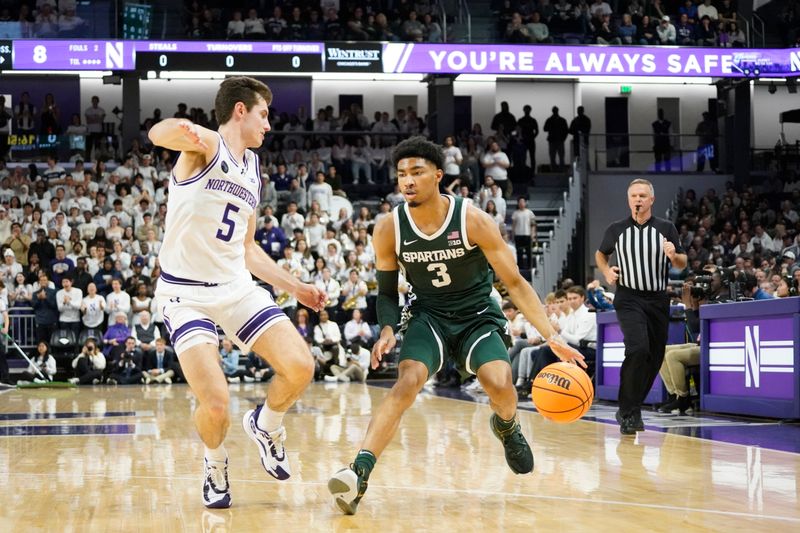 Jan 7, 2024; Evanston, Illinois, USA; Northwestern Wildcats guard Ryan Langborg (5) defends Michigan State Spartans guard Jaden Akins (3) during the first half at Welsh-Ryan Arena. Mandatory Credit: David Banks-USA TODAY Sports