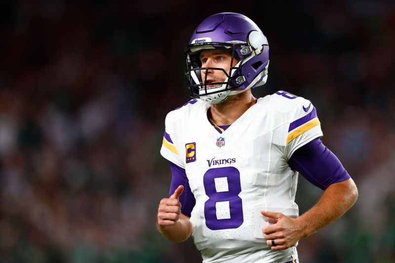 Minnesota Vikings quarterback Kirk Cousins (8) in action against the Philadelphia Eagles during an NFL football game, Thursday, Sep. 14, 2023, in Philadelphia. (AP Photo/Rich Schultz)