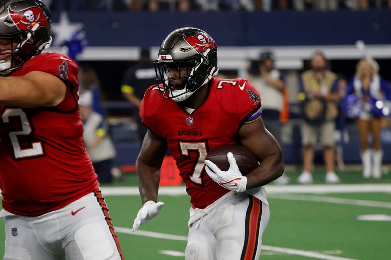 Tampa Bay Buccaneers running back Leonard Fournette (7) runs the ball during an NFL Football game in Arlington, Texas, Sunday, Sept. 11, 2022. (AP Photo/Michael Ainsworth)