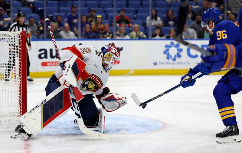 Oct 28, 2024; Buffalo, New York, USA;  Florida Panthers goaltender Sergei Bobrovsky (72) makes a save on Buffalo Sabres right wing Nicolas Aube-Kubel (96) during the second period at KeyBank Center. Mandatory Credit: Timothy T. Ludwig-Imagn Images