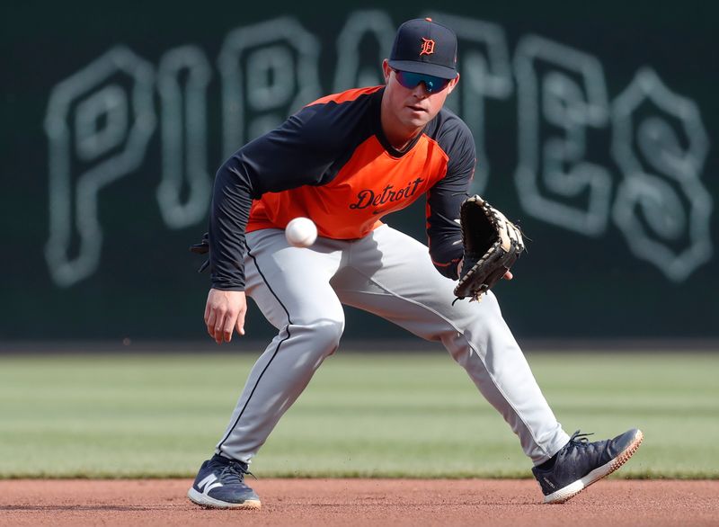 Apr 8, 2024; Pittsburgh, Pennsylvania, USA;  Detroit Tigers first baseman Spencer Torkelson (20) fields ground balls before the game against the Pittsburgh Pirates at PNC Park. Mandatory Credit: Charles LeClaire-USA TODAY Sports