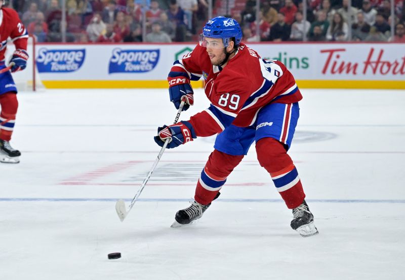 Sep 23, 2024; Montreal, Quebec, CAN; Montreal Canadiens forward Joshua Roy (89) plays the puck against the Philadelphia Flyers during the second period at the Bell Centre. Mandatory Credit: Eric Bolte-Imagn Images